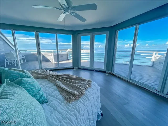a view of outdoor space and deck in the sunset