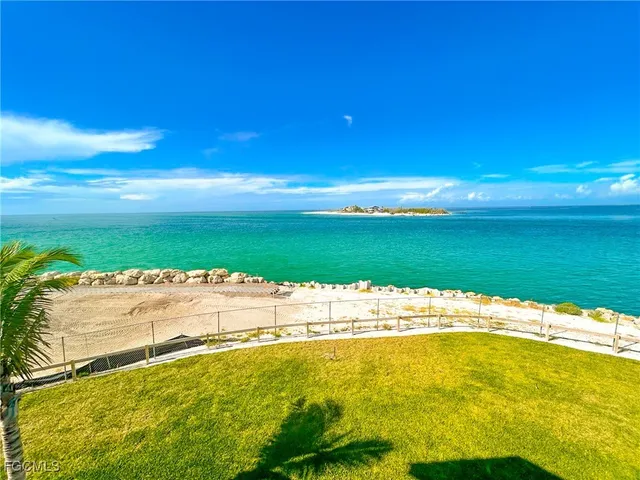 an aerial view of a house with outdoor space