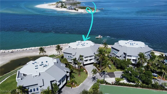 an aerial view of a house with outdoor space