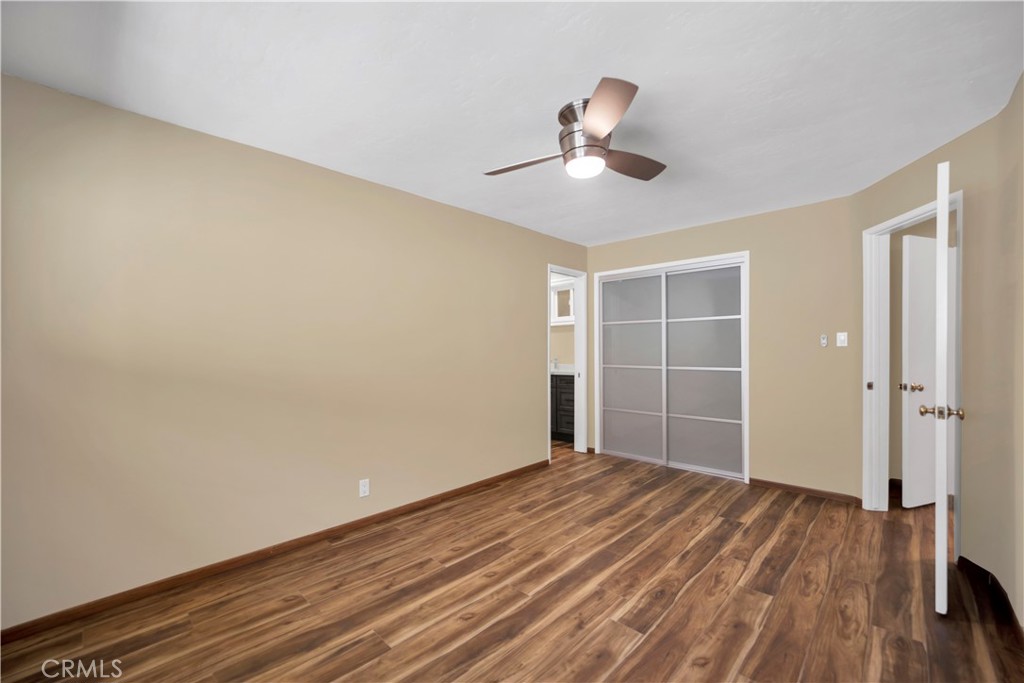 2214 2nd Street, Unit 6 Long Beach, CA 90803 - Photo 12 of 22 a view of empty room with wooden floor and fan