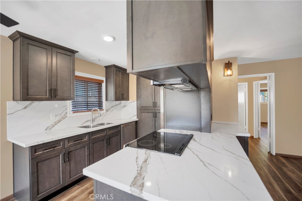 2214 2nd Street, Unit 6 Long Beach, CA 90803 - Photo 2 of 22 a kitchen with a sink a stove and refrigerator