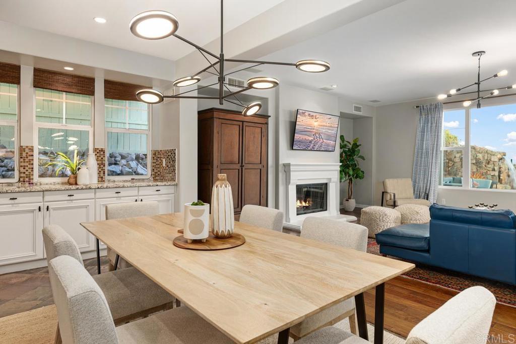 7627 Circulo Sequoia Carlsbad, CA 92009 - Photo 18 of 72 a view of a dining room with furniture window and outside view