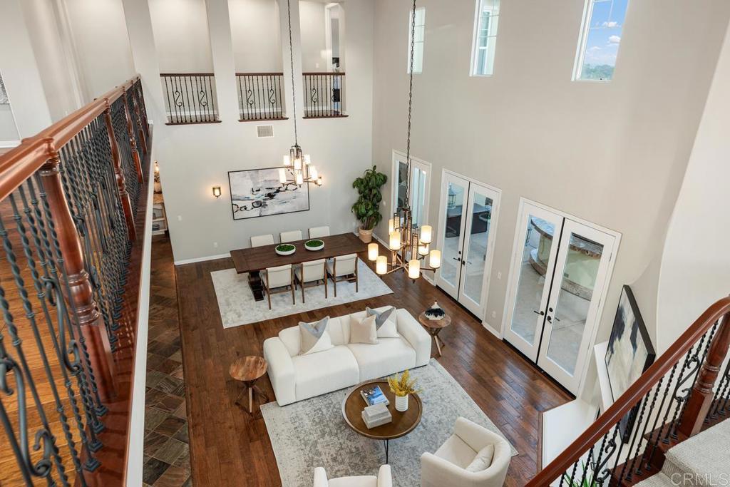 7627 Circulo Sequoia Carlsbad, CA 92009 - Photo 35 of 72 a living room with furniture and wooden floor