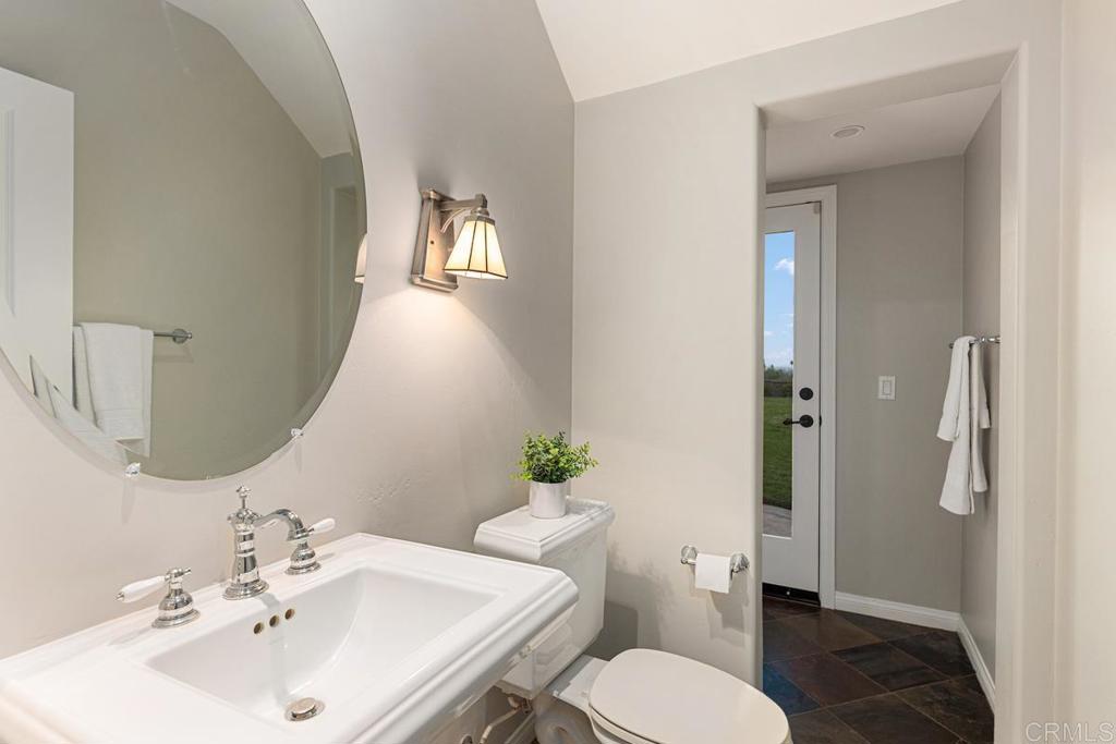 7627 Circulo Sequoia Carlsbad, CA 92009 - Photo 55 of 72 a bathroom with a sink toilet and shower