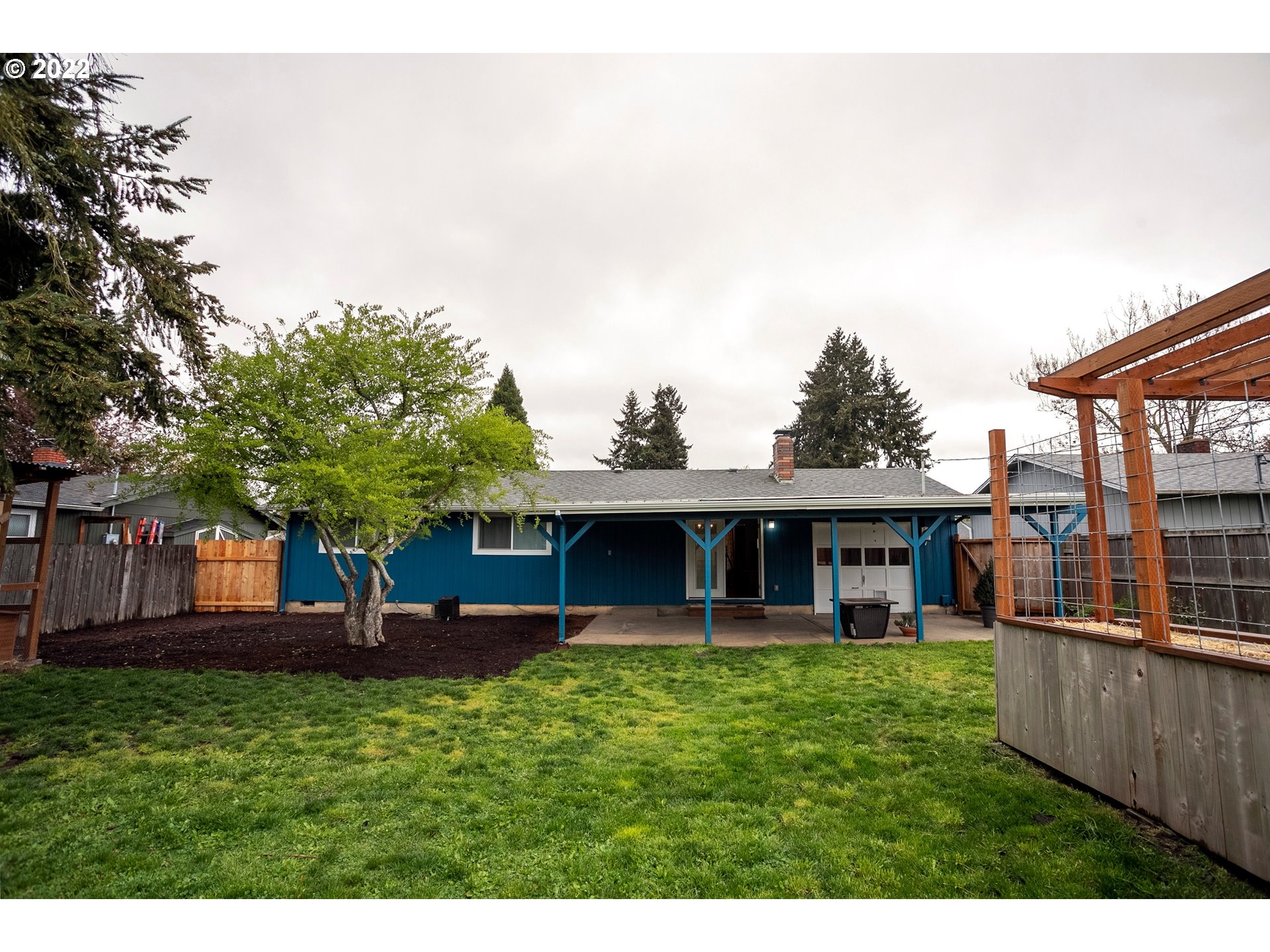 450 South 39th Place Springfield, OR 97478 - Photo 28 of 28 a view of a house with a backyard