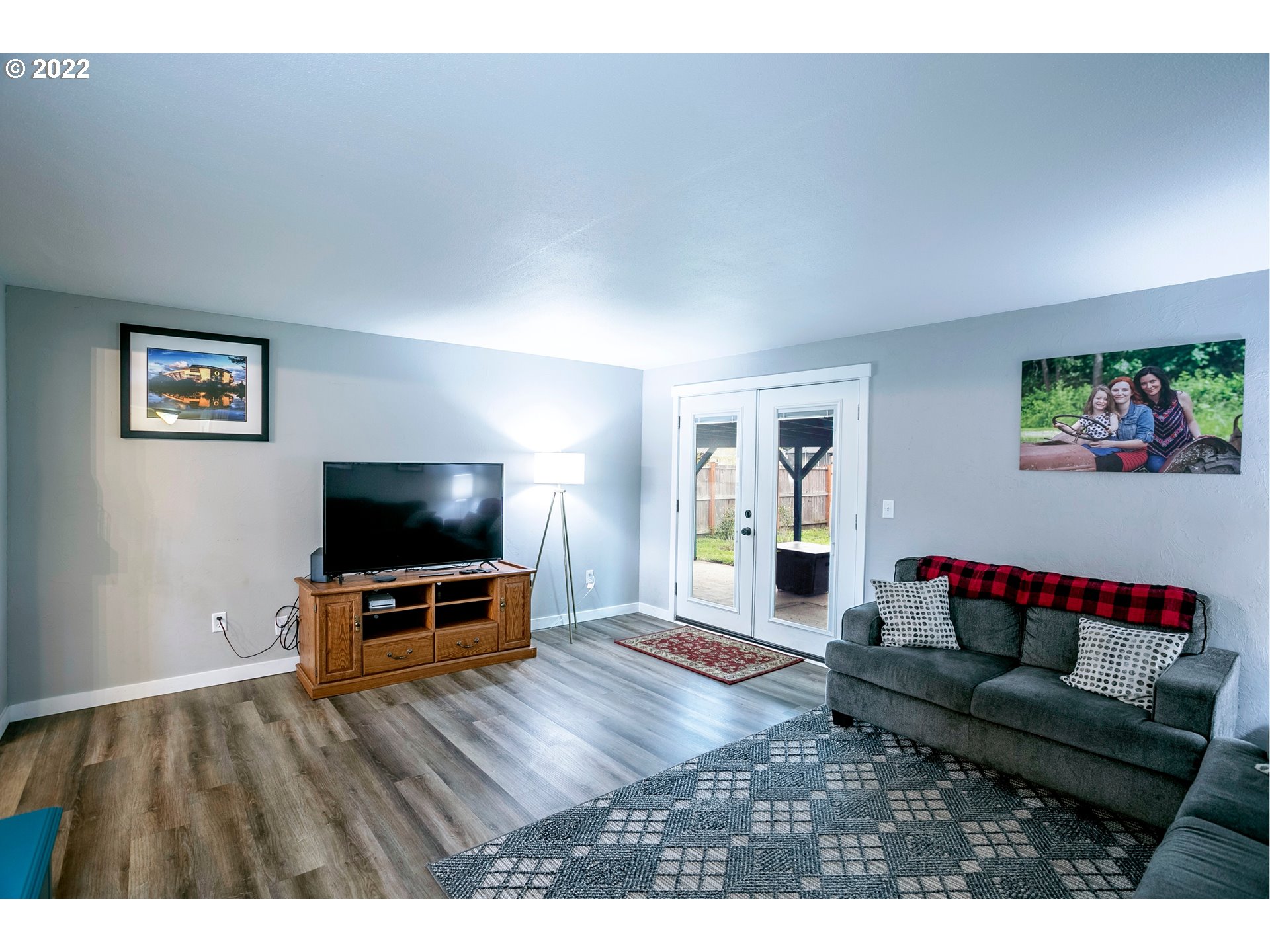 450 South 39th Place Springfield, OR 97478 - Photo 5 of 28 a living room with furniture and a flat screen tv