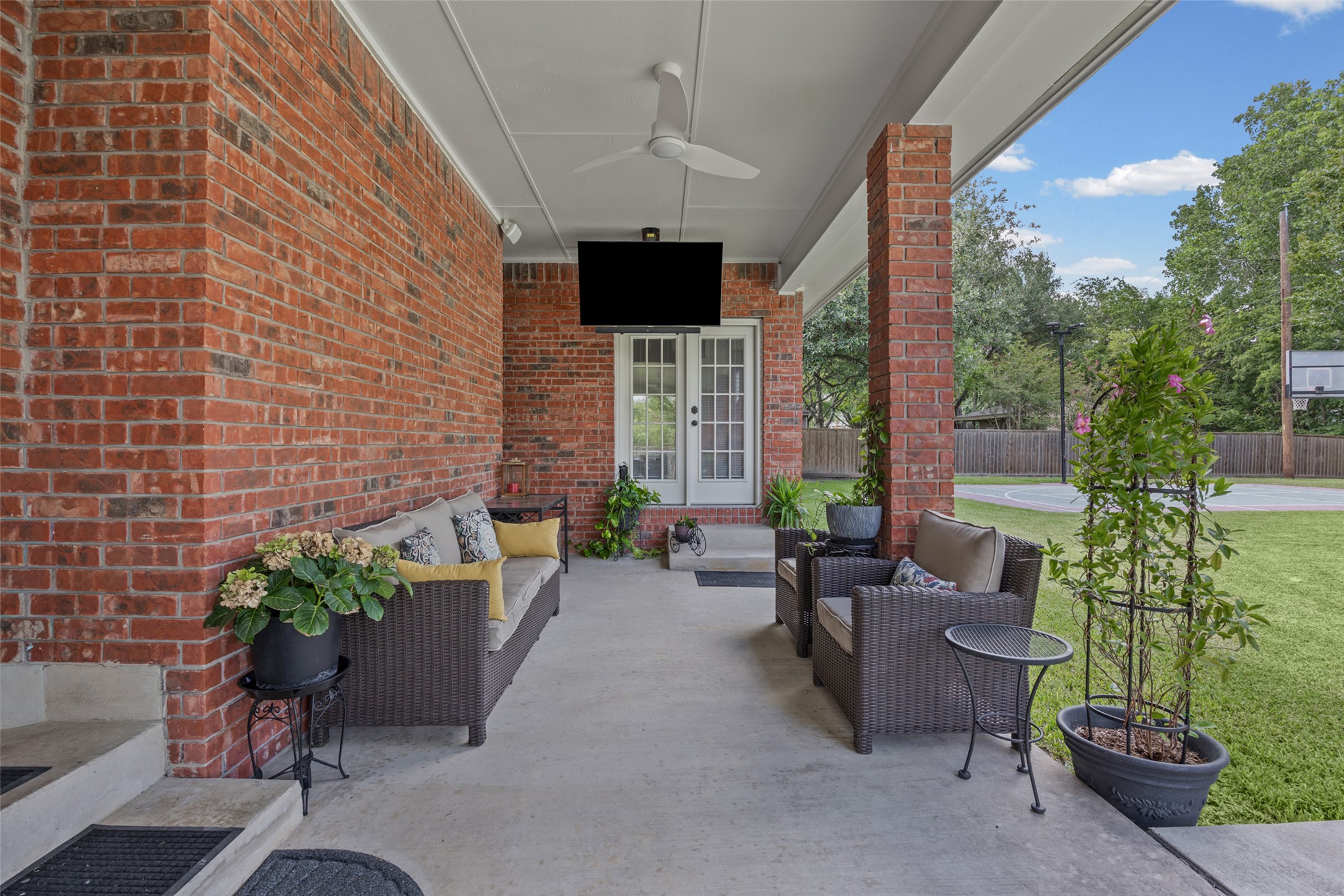 2000 Spinel Road Pflugerville, TX 78660 - Photo 23 of 31 An inviting brick porch provides an ideal space for outdoor relaxation and entertaining.
