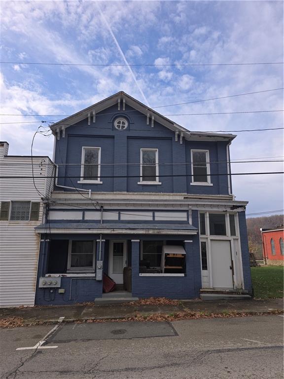320 Main Street Fayette City, PA 15438 - Photo 1 of 28 a front view of a house with a garage