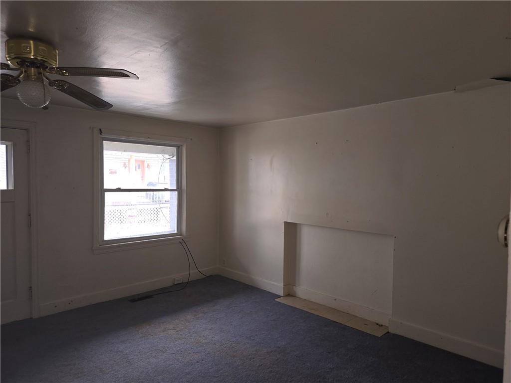 320 Main Street Fayette City, PA 15438 - Photo 14 of 28 an empty room with a empty space and windows