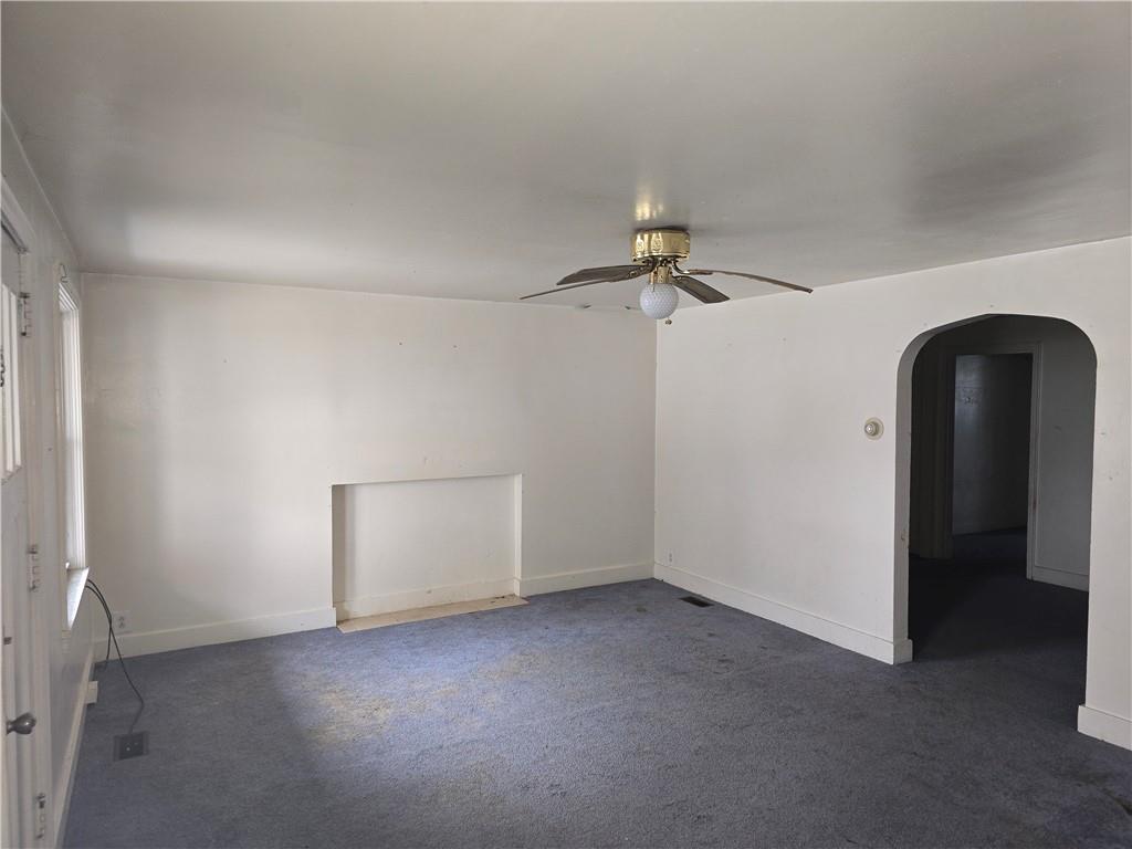 320 Main Street Fayette City, PA 15438 - Photo 15 of 28 an empty room with chandelier fan