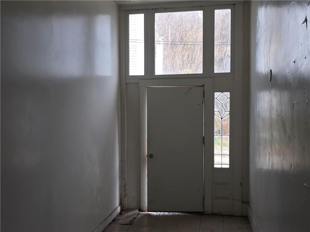 320 Main Street Fayette City, PA 15438 - Photo 4 of 28 an empty room with windows