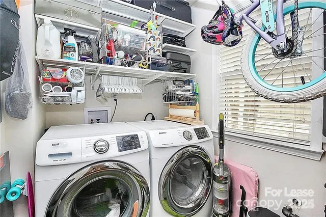 a utility room with dryer and washer