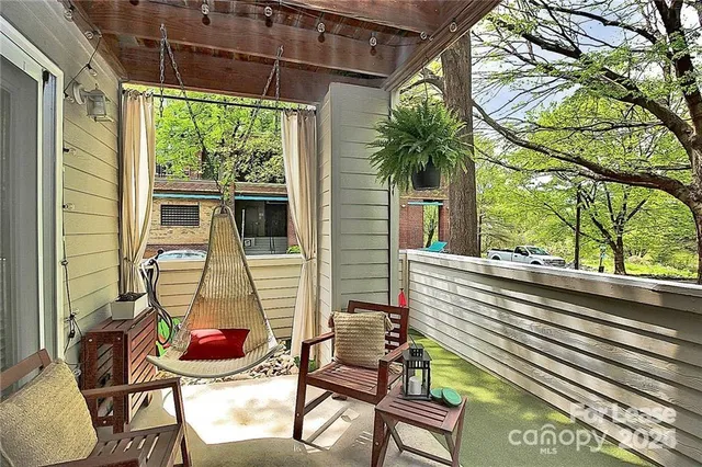 a view of a chairs and table in a patio