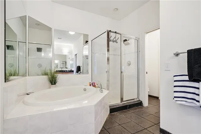 a bathroom with a bathtub and a sink