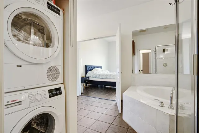 a en suite bathroom with a sink a toilet and a shower