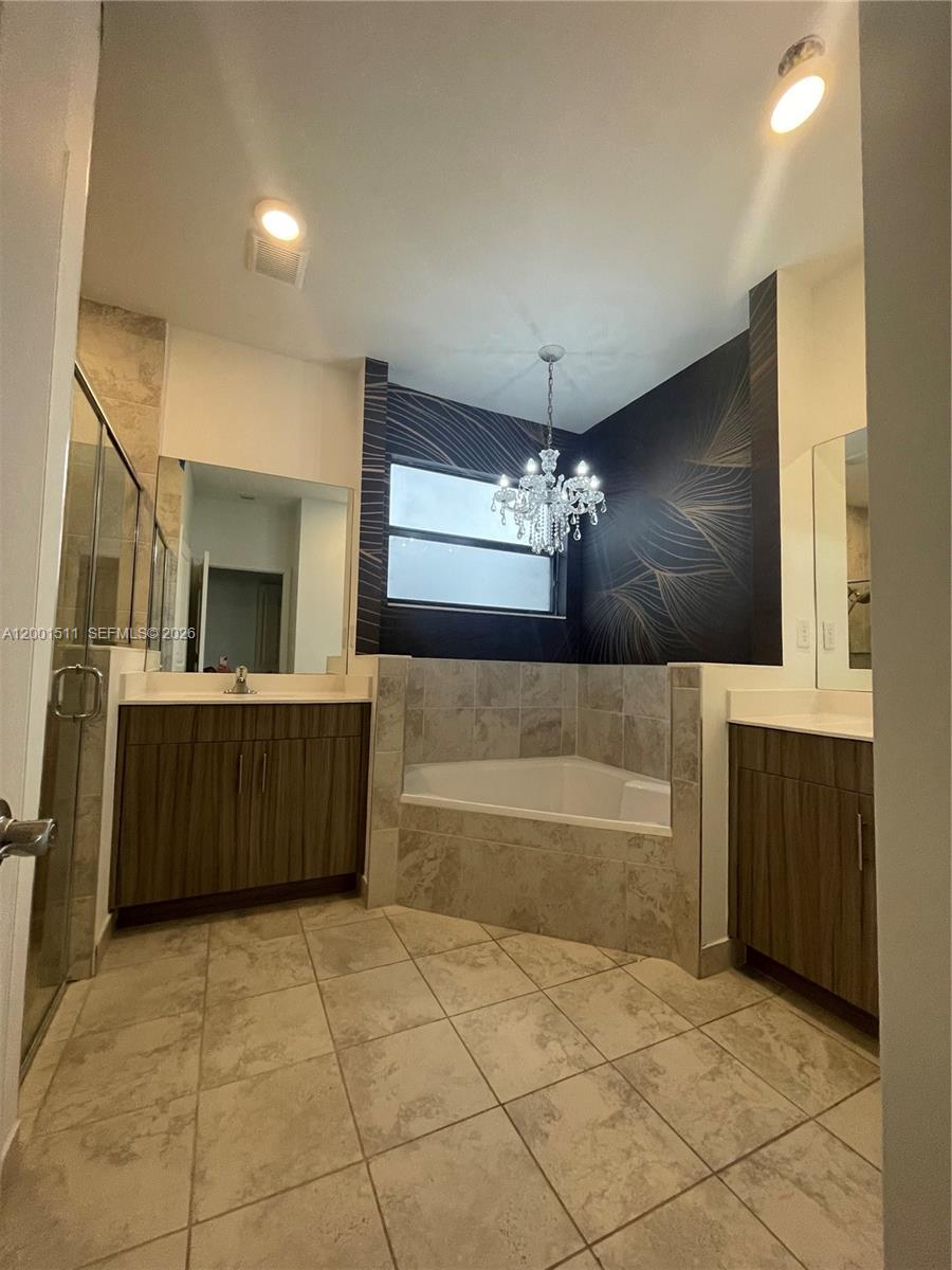 4451 Southwest 159th Path Miami, FL 33185 - Photo 22 of 24 a view of a kitchen with a sink and cabinets