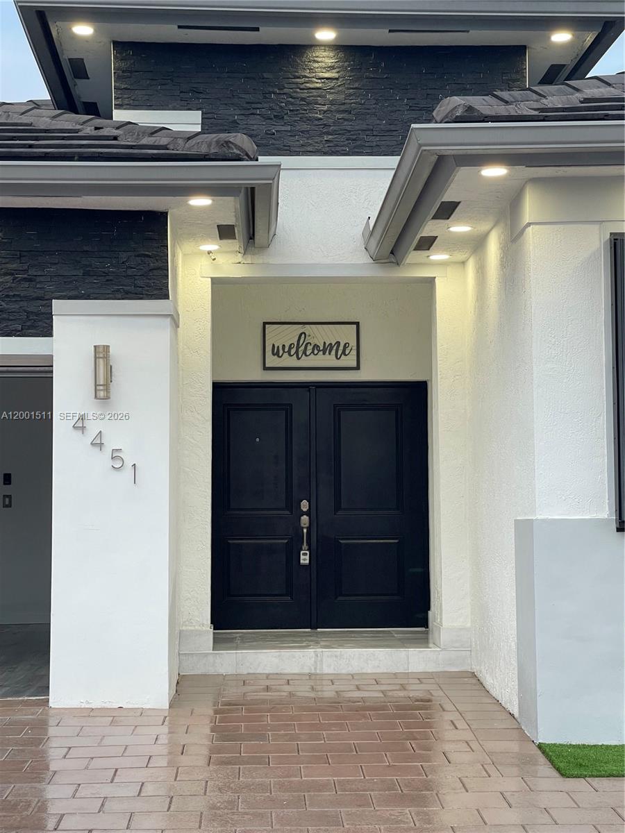 4451 Southwest 159th Path Miami, FL 33185 - Photo 4 of 24 a view of an entryway
