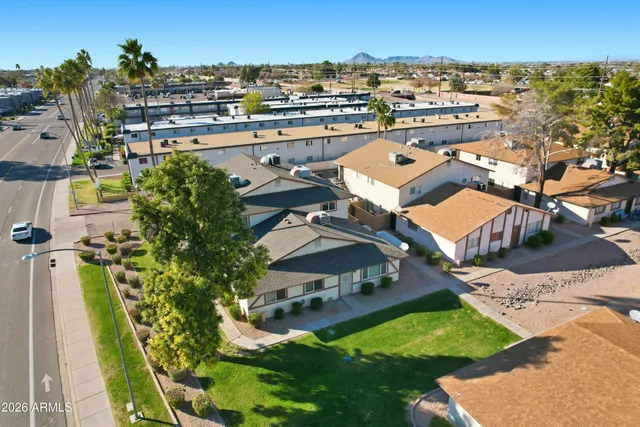 an aerial view of a house with a garden