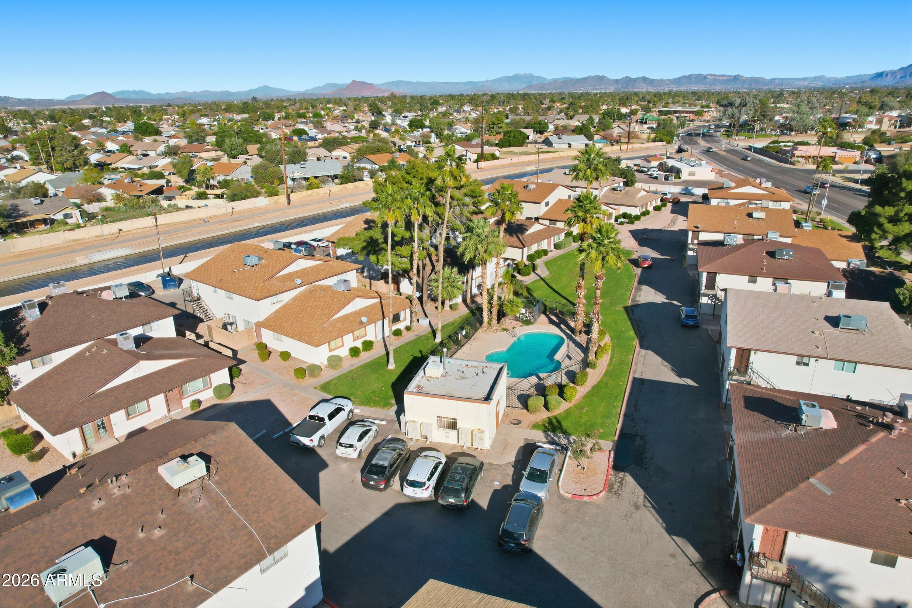 860 East Brown Road, Unit 29 Mesa, AZ 85203 - Photo 14 of 54 an aerial view of multiple house