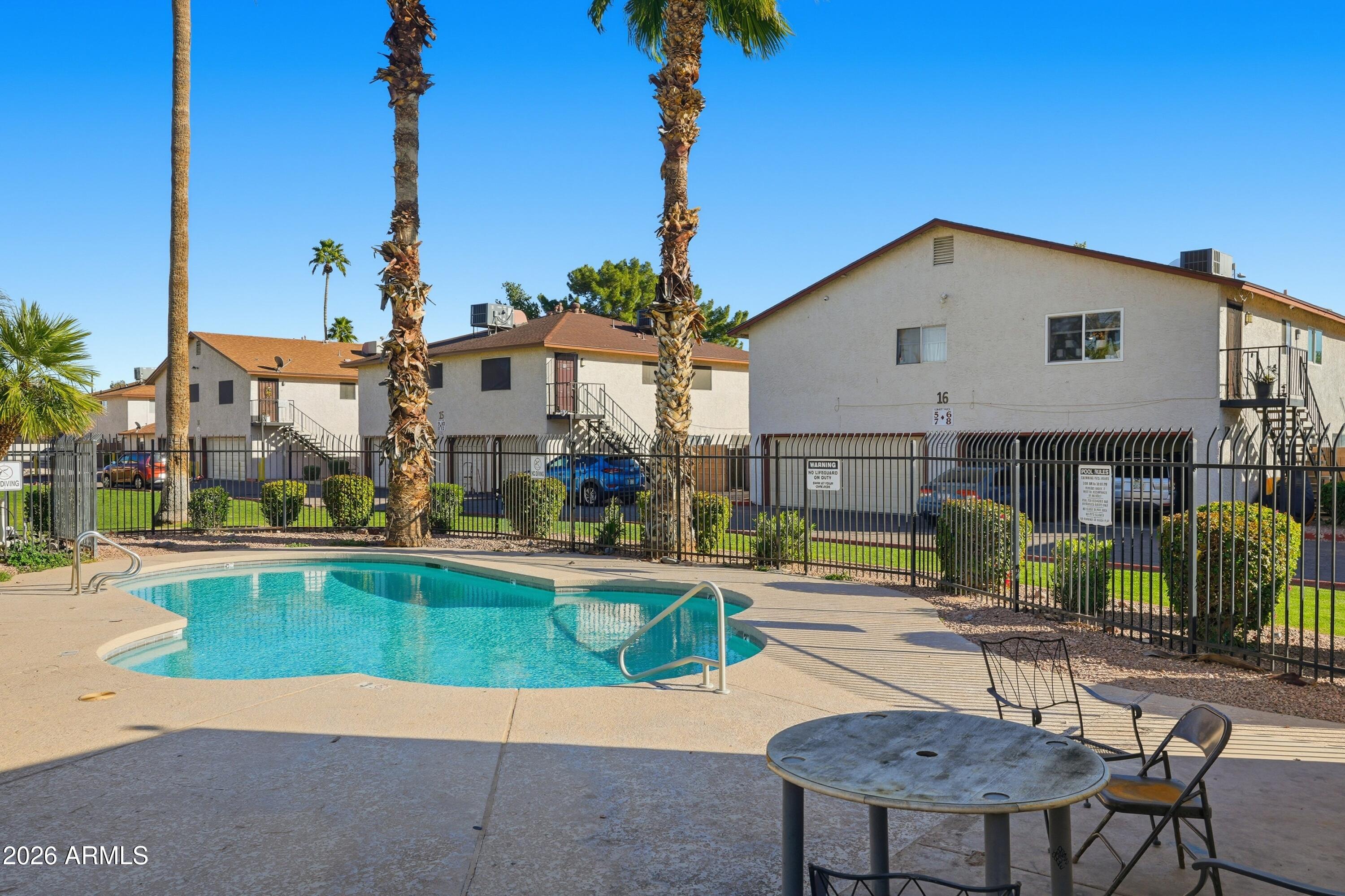 860 East Brown Road, Unit 29 Mesa, AZ 85203 - Photo 17 of 54 a house view with a outdoor space