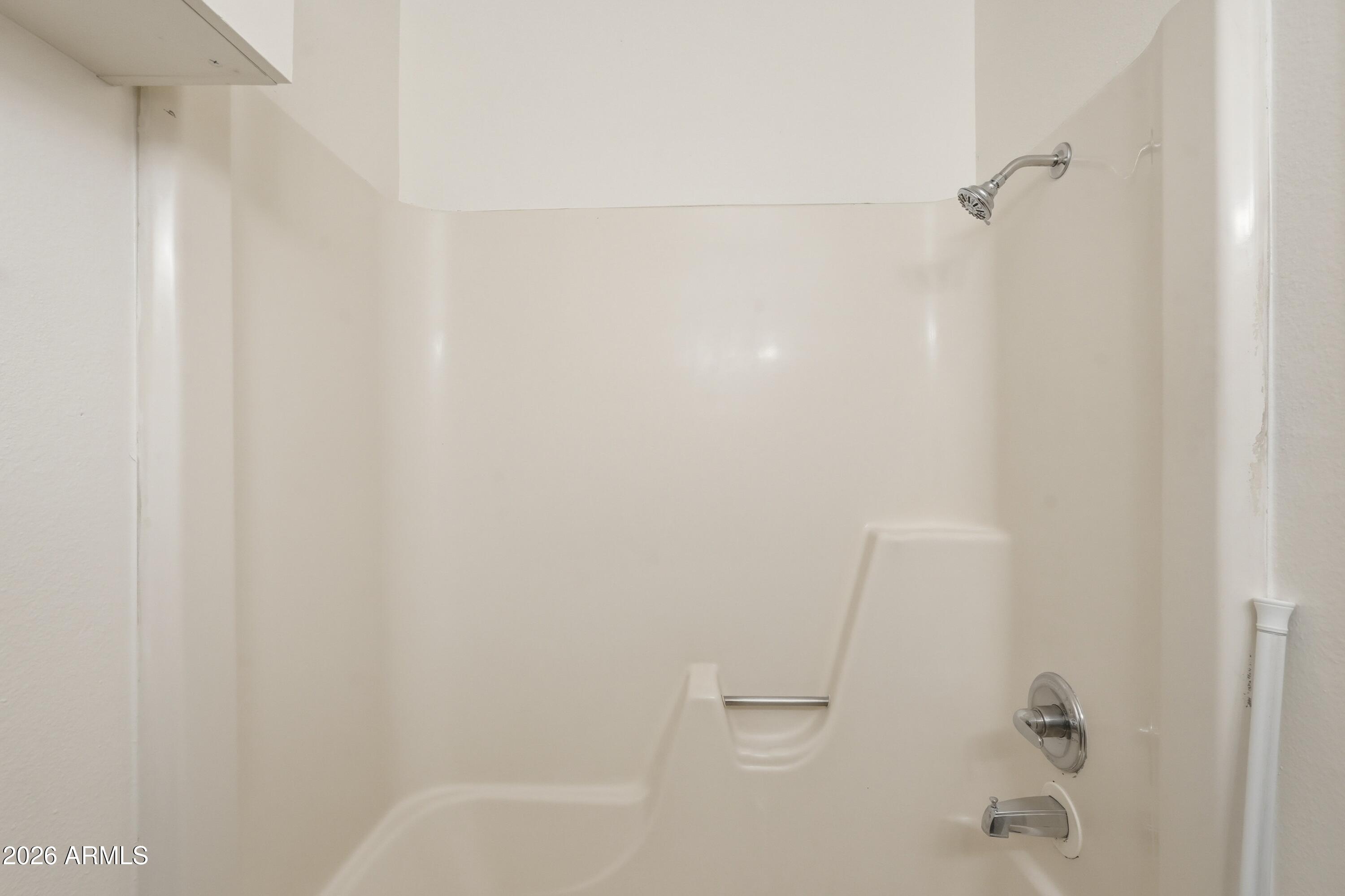 860 East Brown Road, Unit 29 Mesa, AZ 85203 - Photo 37 of 54 a close up of a bathtub