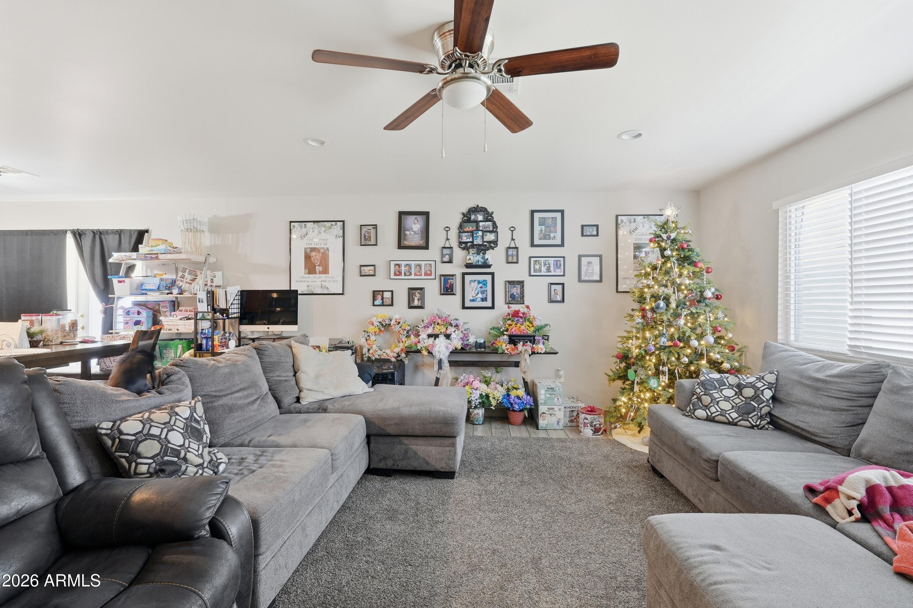 860 East Brown Road, Unit 29 Mesa, AZ 85203 - Photo 41 of 54 a living room with furniture and a couch