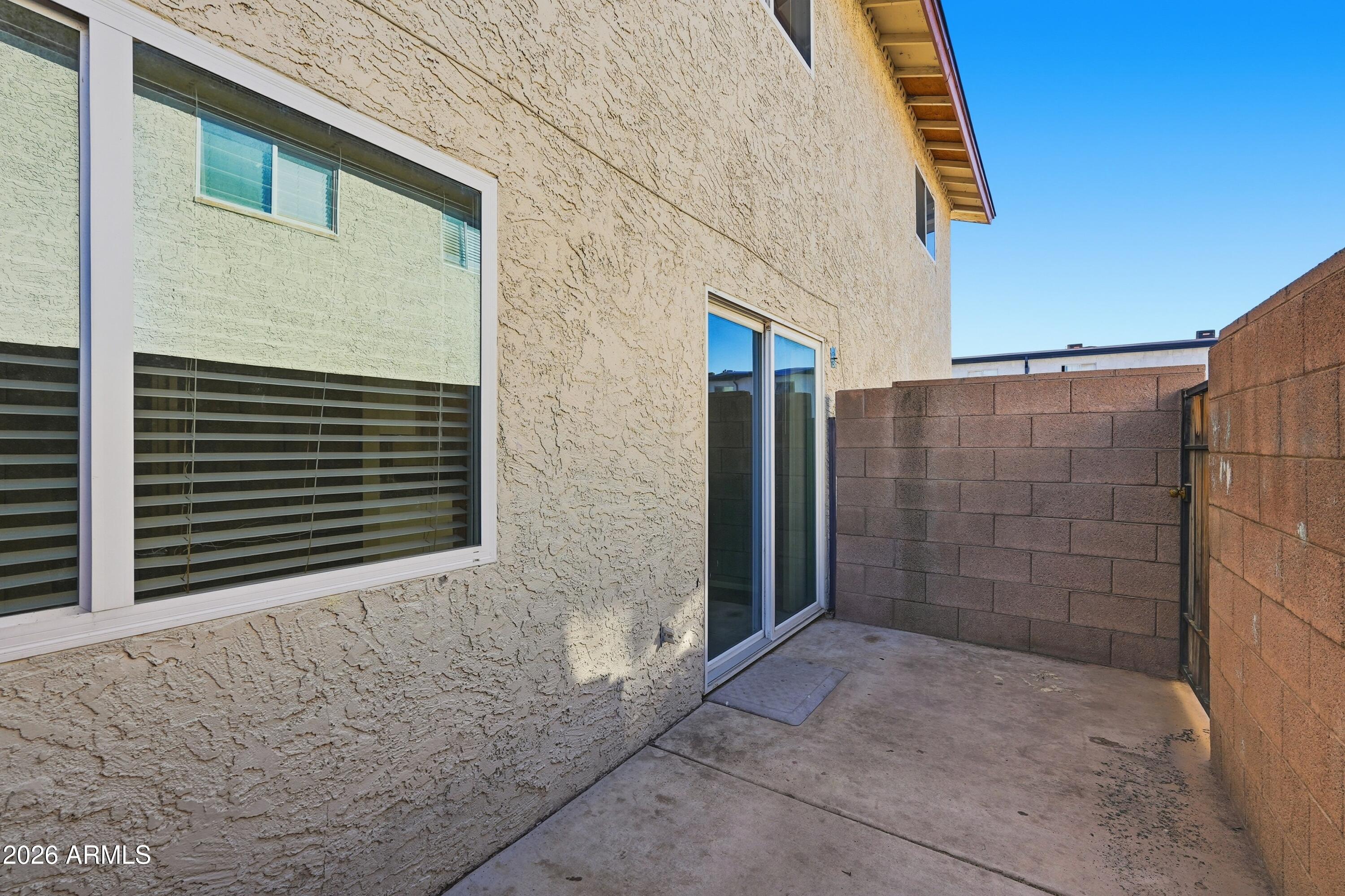 860 East Brown Road, Unit 29 Mesa, AZ 85203 - Photo 54 of 54 a view of a house with a backyard