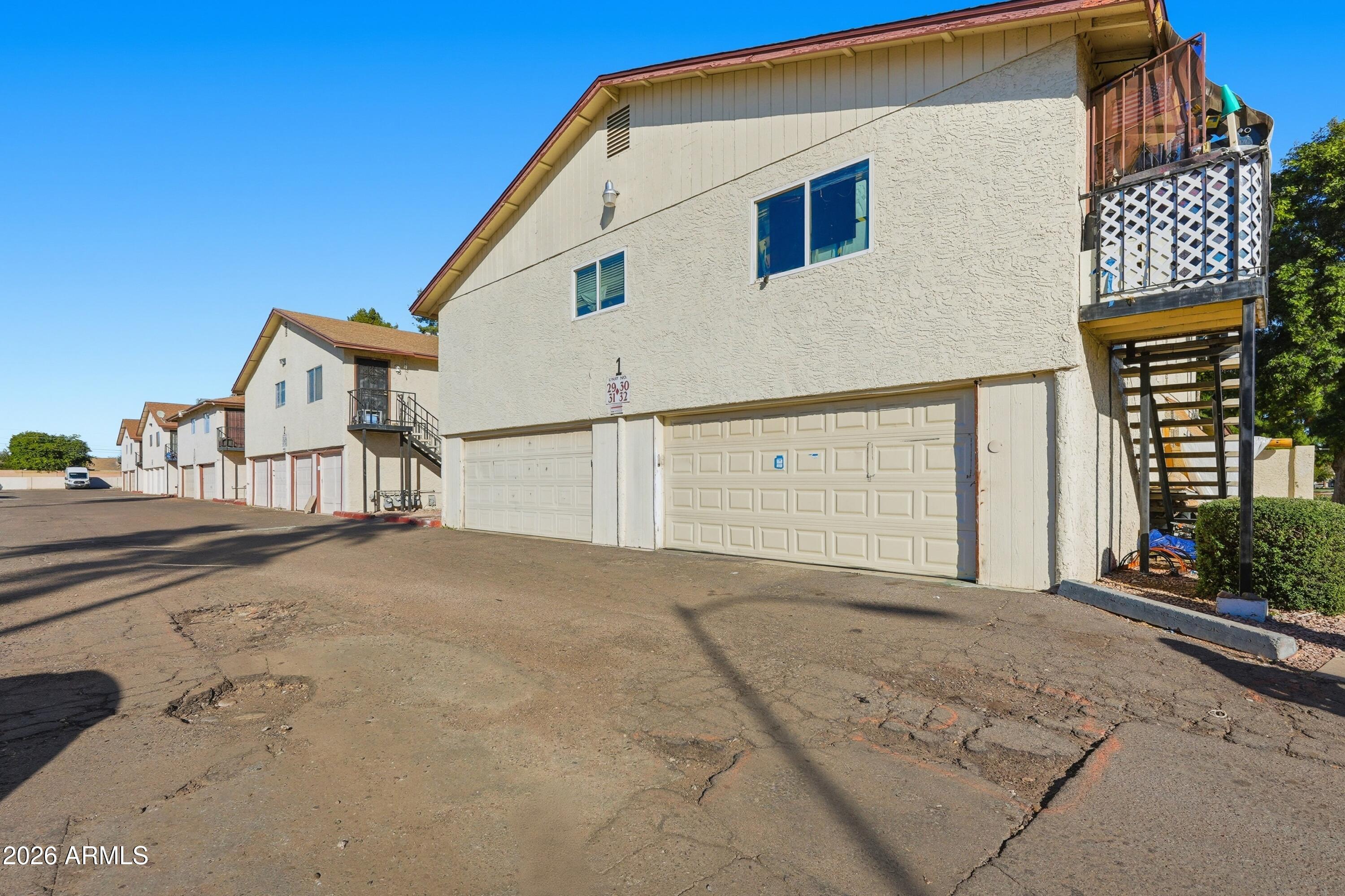 860 East Brown Road, Unit 29 Mesa, AZ 85203 - Photo 7 of 54 a view of a house with a outdoor space