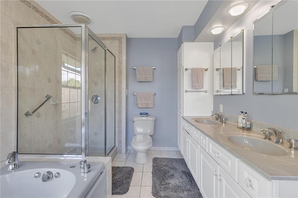1020 River Road Beaver, PA 15009 - Photo 29 of 42 a bathroom with a tub sink toilet and mirror