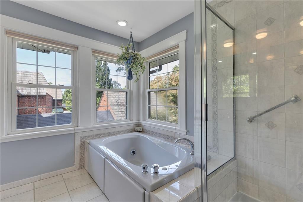 1020 River Road Beaver, PA 15009 - Photo 30 of 42 a bathroom with a bathtub a shower and a sink