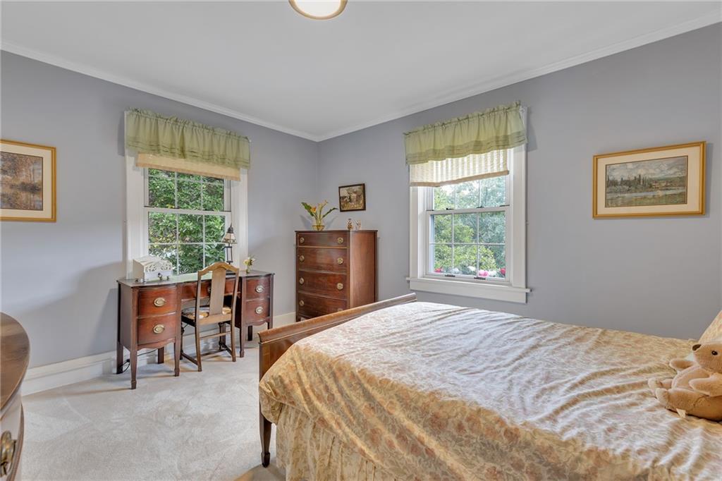 1020 River Road Beaver, PA 15009 - Photo 31 of 42 a bedroom with a bed and a table