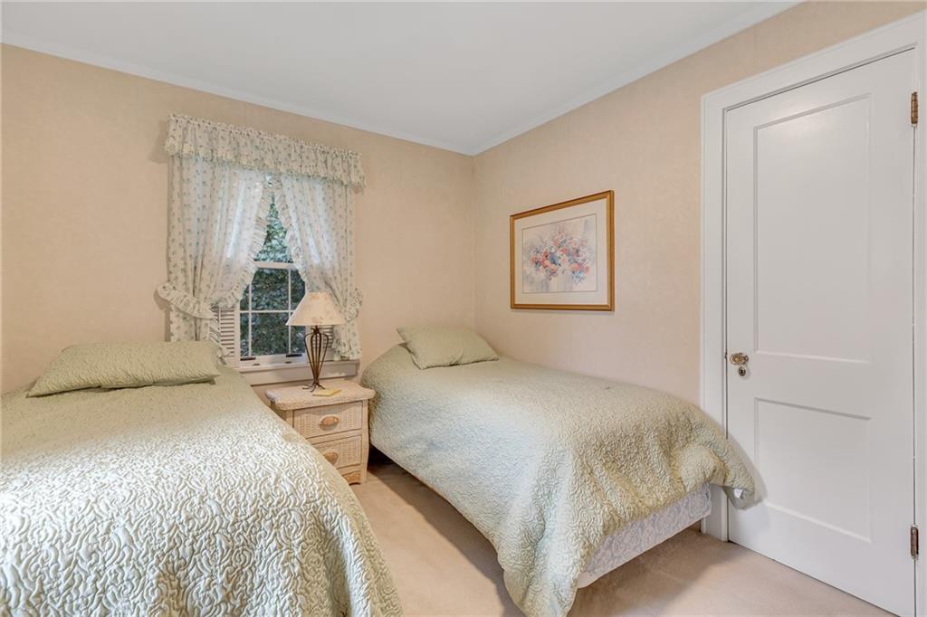 1020 River Road Beaver, PA 15009 - Photo 34 of 42 a bedroom with a bed and a night stand