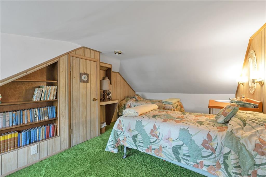 1020 River Road Beaver, PA 15009 - Photo 37 of 42 a bedroom with bed and a book shelf