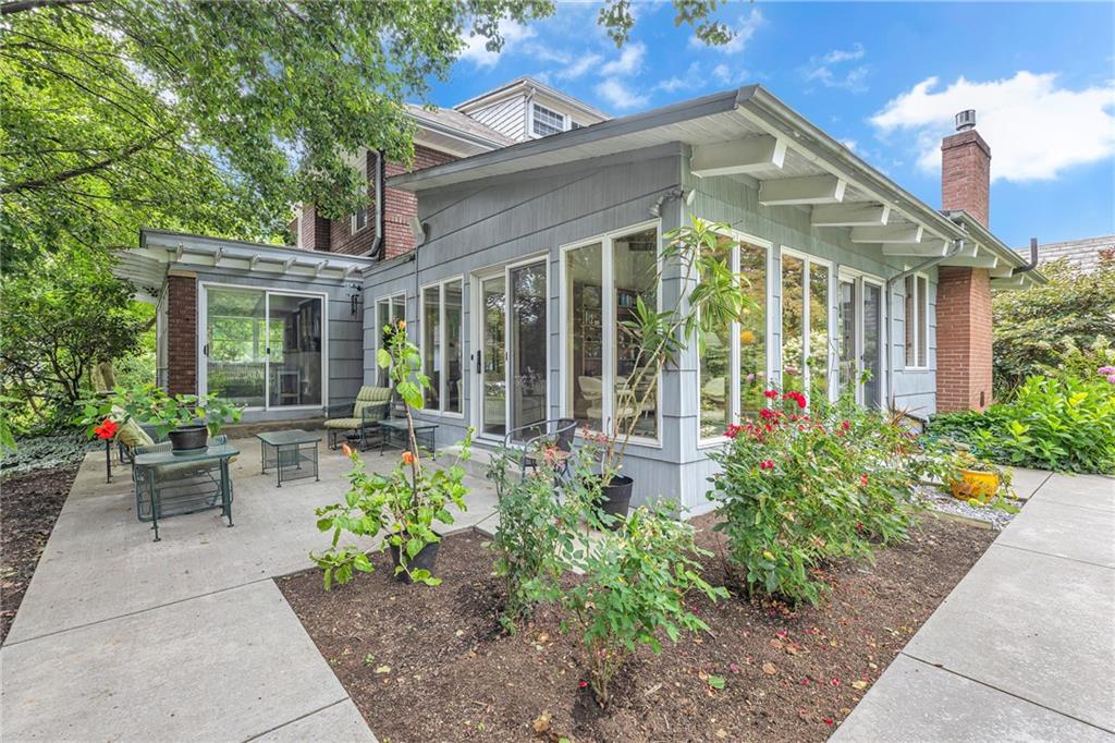1020 River Road Beaver, PA 15009 - Photo 5 of 42 a view of a house with sitting area and garden