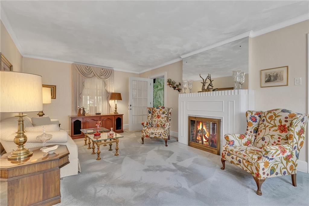 1020 River Road Beaver, PA 15009 - Photo 10 of 42 a living room with furniture and a fireplace
