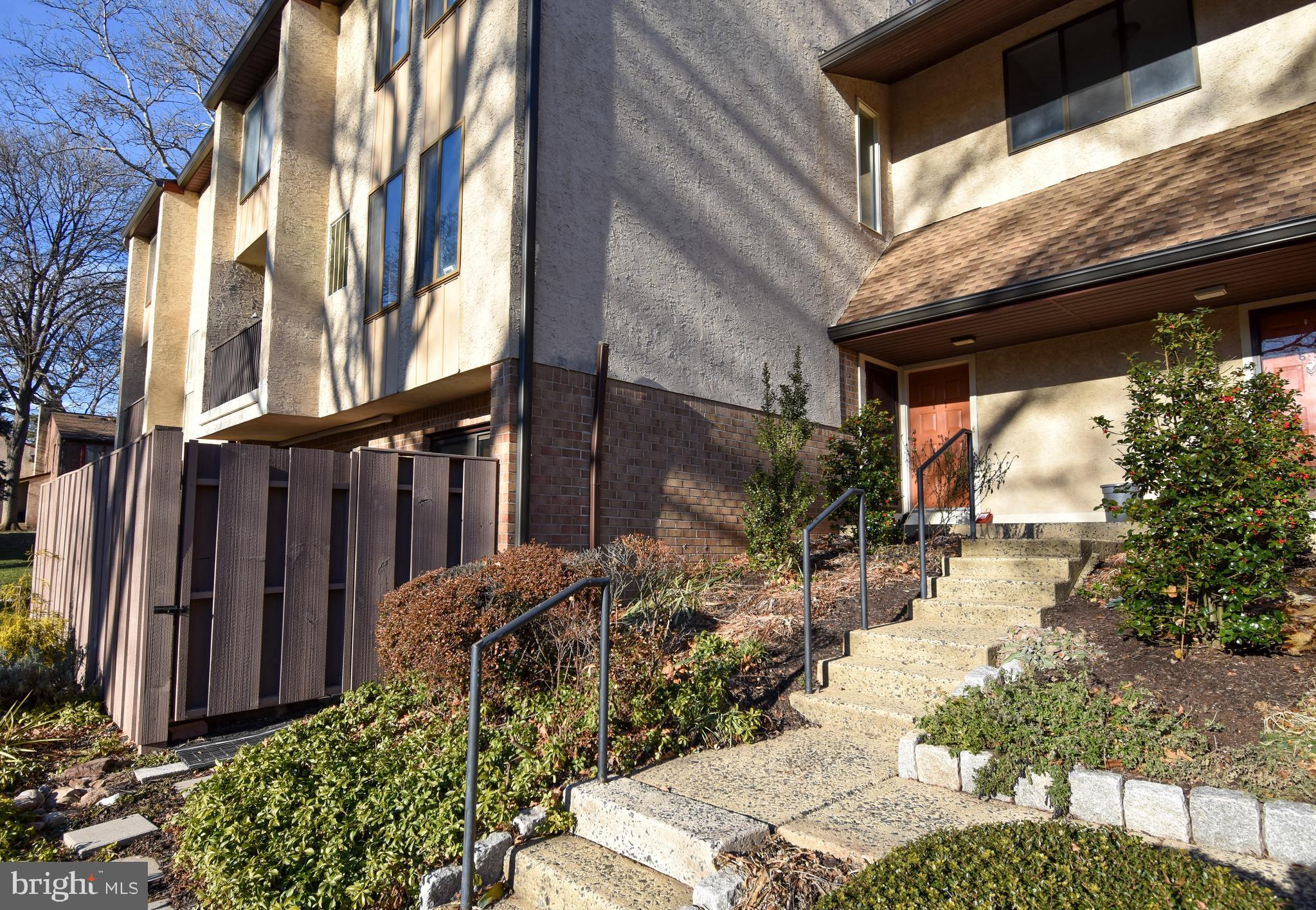 a view of a pathway along the building