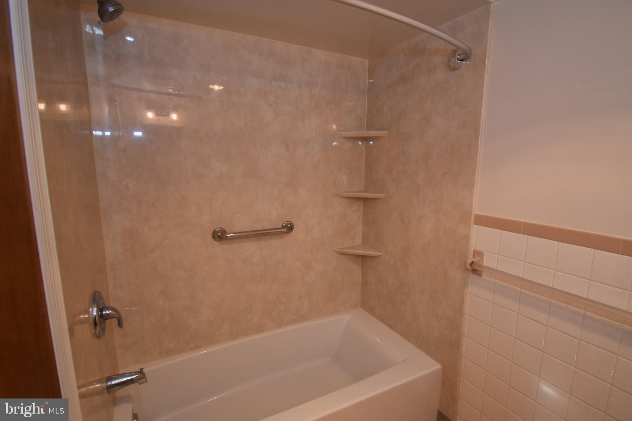 6-1 Aspen Way Doylestown, PA 18901 - Photo 12 of 19 a bathroom with a shower and a bath tub