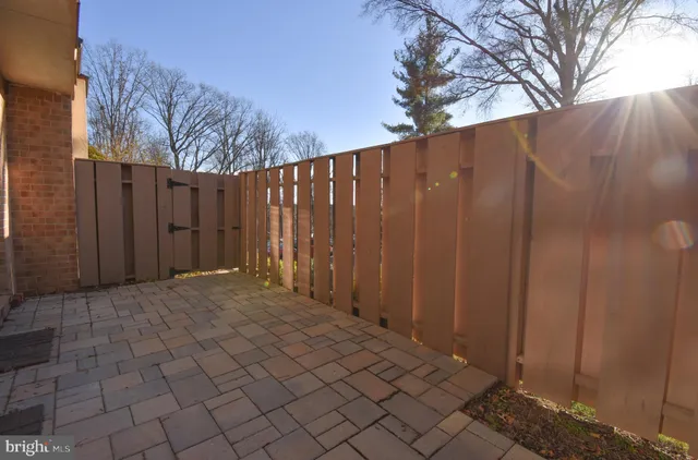 a view of a wooden fence