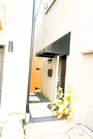 a black and white photo of a living room