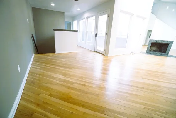 a view of an empty room with a window