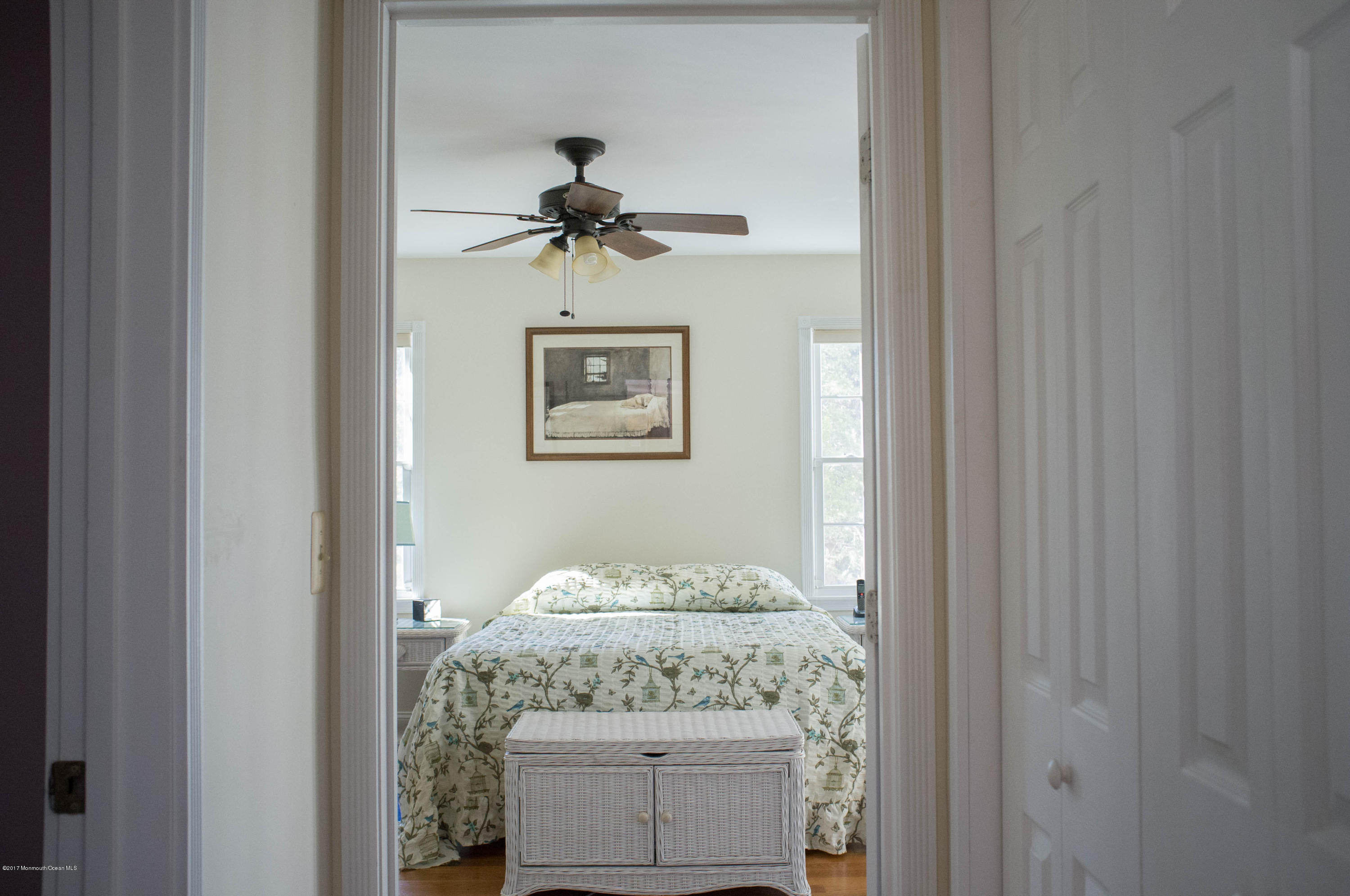 1438 Radio Road Little Egg Harbor, NJ 08087 - Photo 22 of 49 a view of a hallway with a chandelier