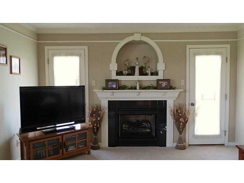 126 Lentz Road Latrobe, PA 15650 - Photo 18 of 25 Family Room. FR with gas fireplace, double doors that lead to side deck.