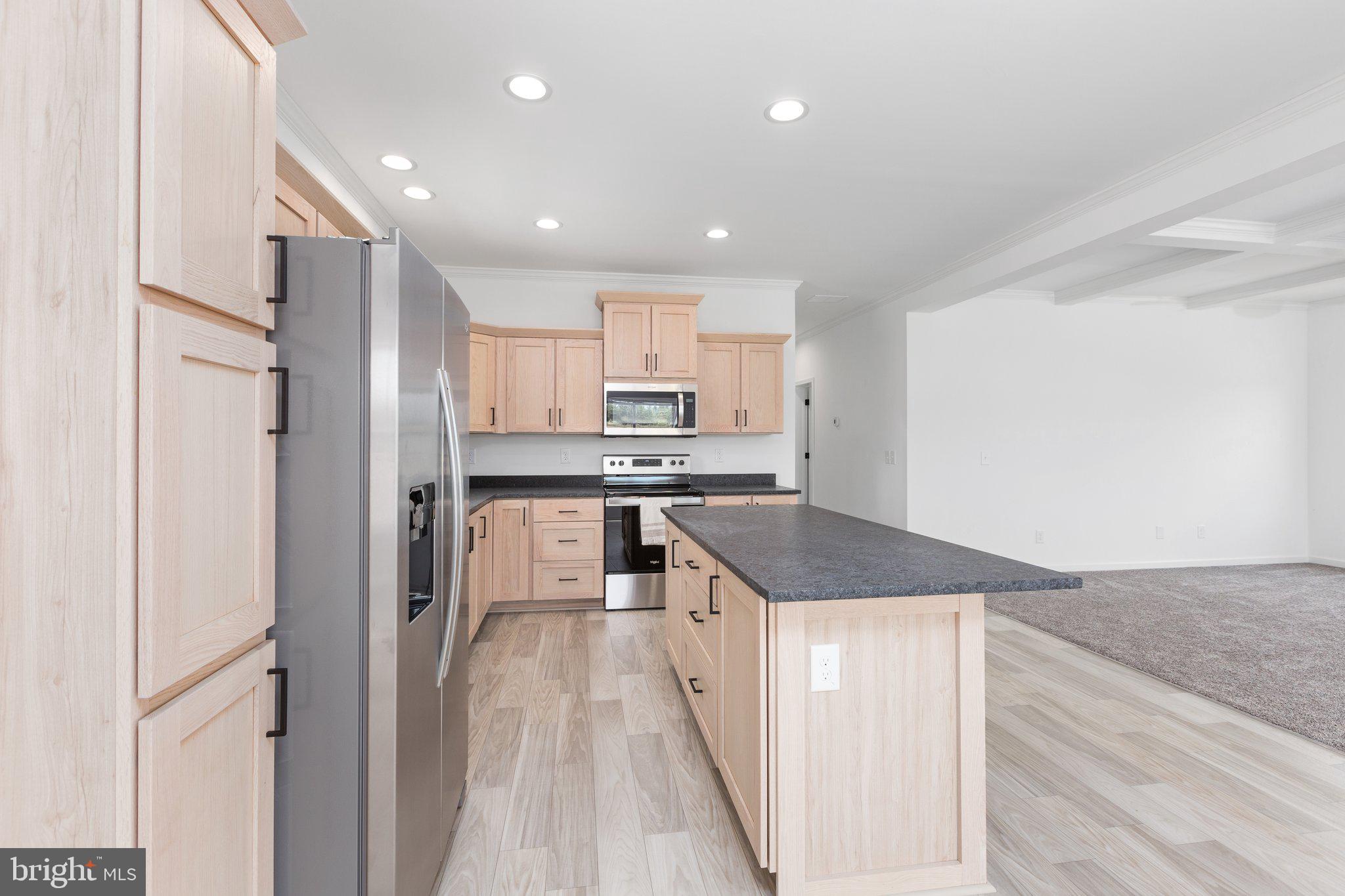 967 Levi Road Green Bay, VA 23942 - Photo 11 of 39 a kitchen with stainless steel appliances granite countertop a refrigerator a sink and a stove