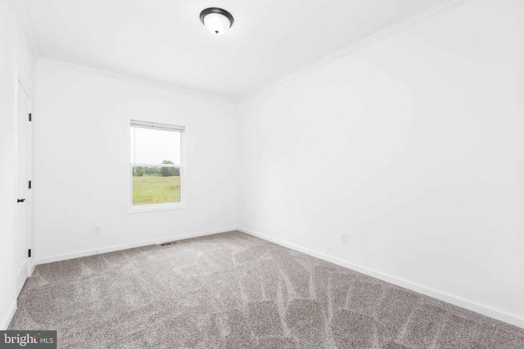 967 Levi Road Green Bay, VA 23942 - Photo 16 of 39 a view of an empty room and a window
