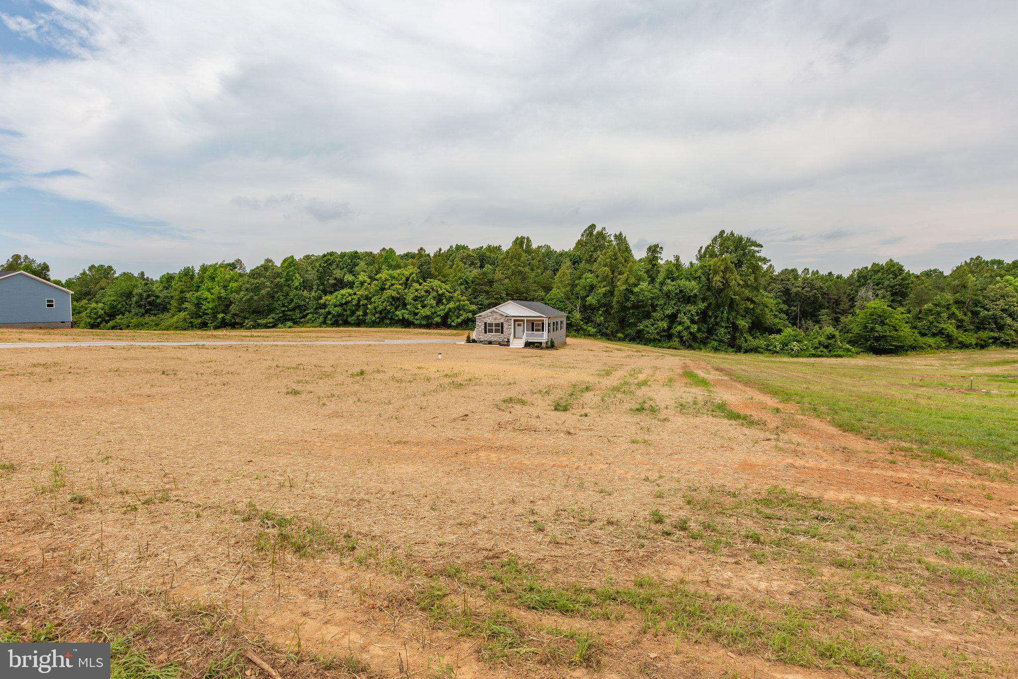 967 Levi Road Green Bay, VA 23942 - Photo 32 of 39 a view of a lake view with houses in back