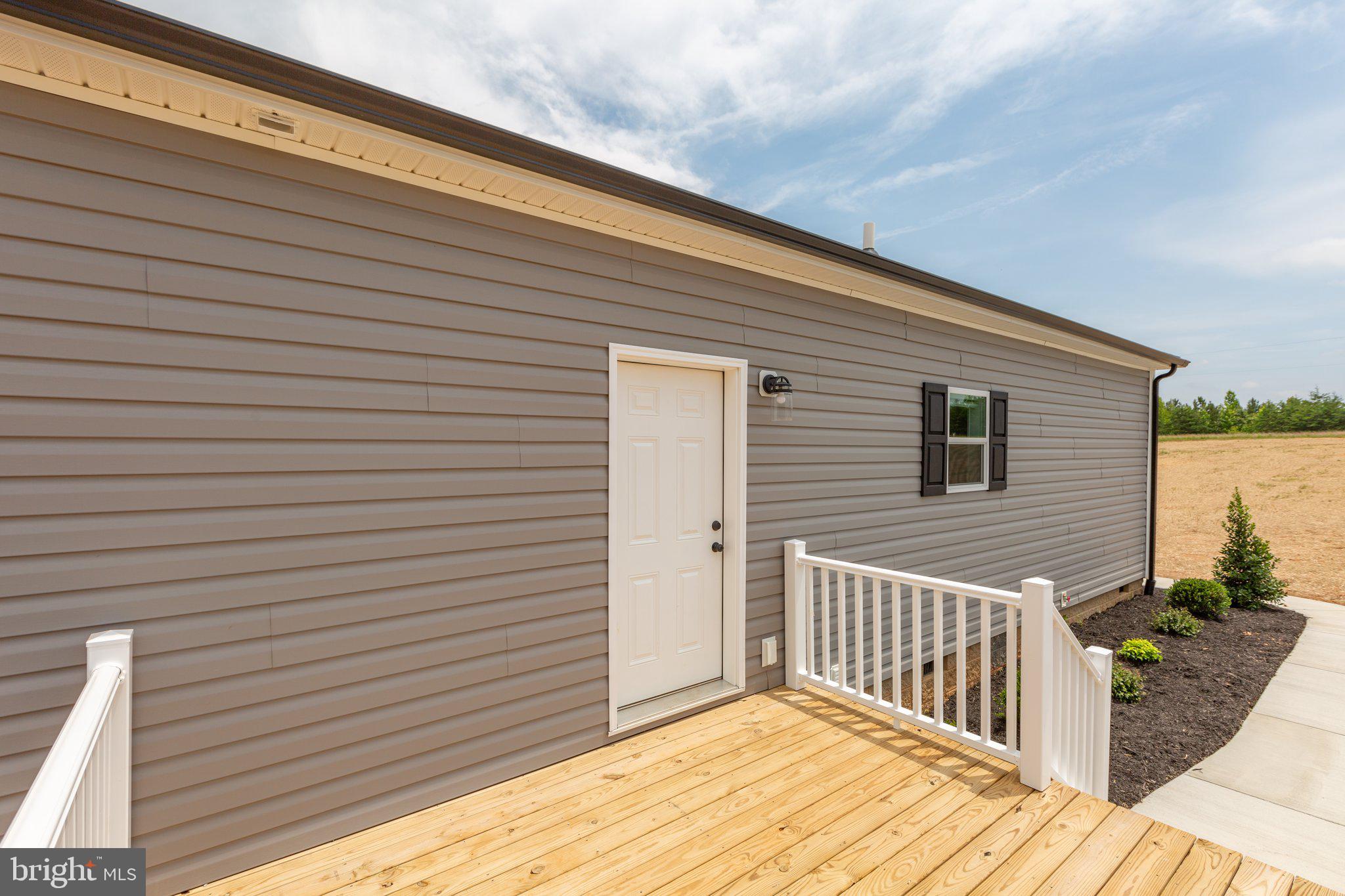 967 Levi Road Green Bay, VA 23942 - Photo 38 of 39 a view of a wooden balcony