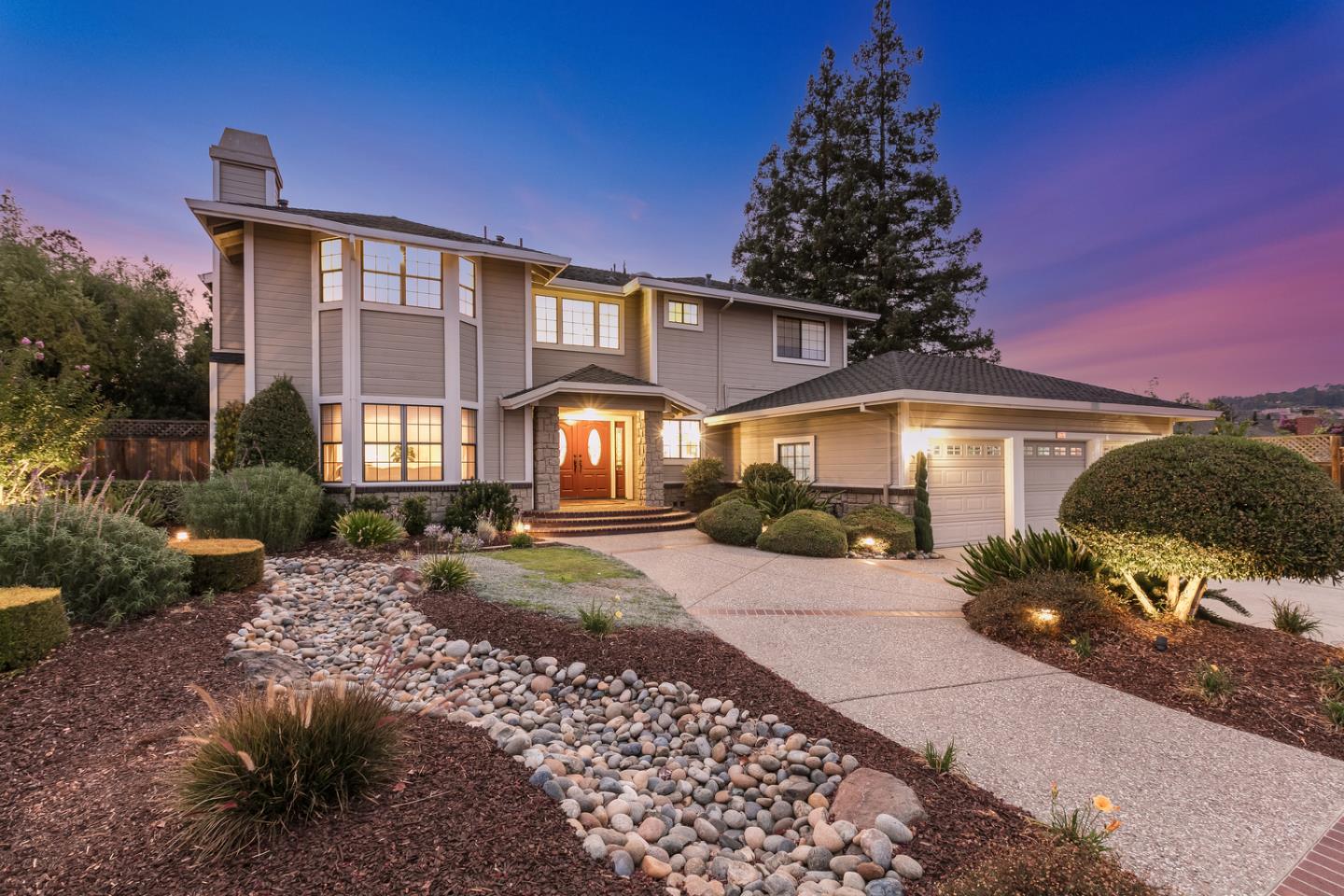 757 Harry Road San Jose, CA 95120 - Photo 3 of 60 a front view of a house with garden