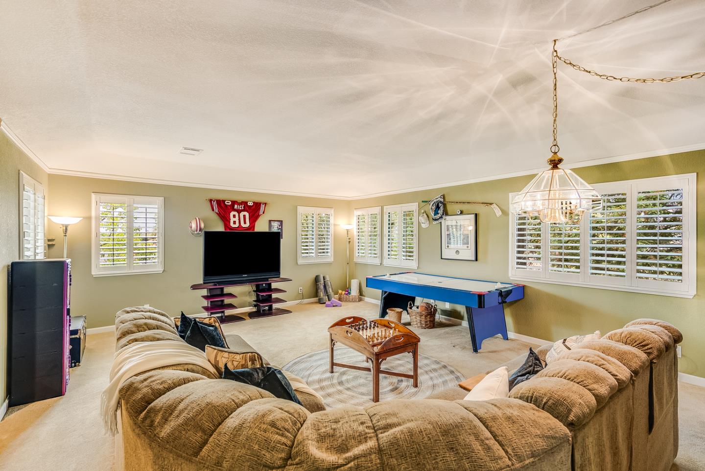 757 Harry Road San Jose, CA 95120 - Photo 34 of 60 a living room with furniture a flat screen tv and a window