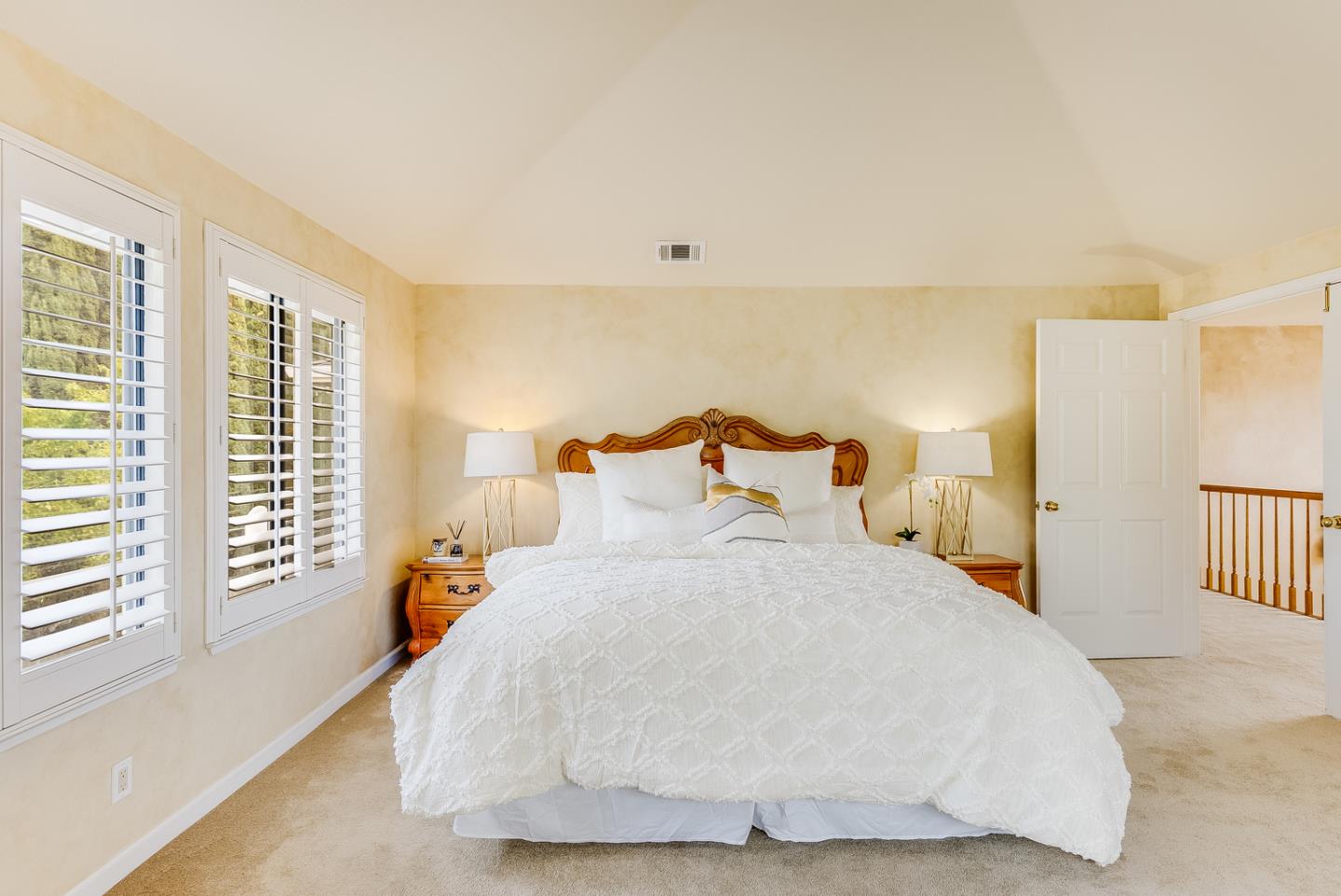 757 Harry Road San Jose, CA 95120 - Photo 40 of 60 a bedroom with a bed and wooden floor