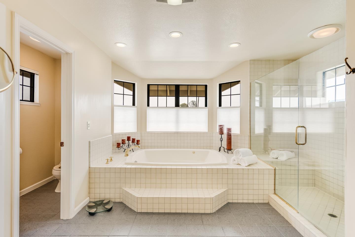 757 Harry Road San Jose, CA 95120 - Photo 42 of 60 a bathroom with a bathtub shower sink and mirror